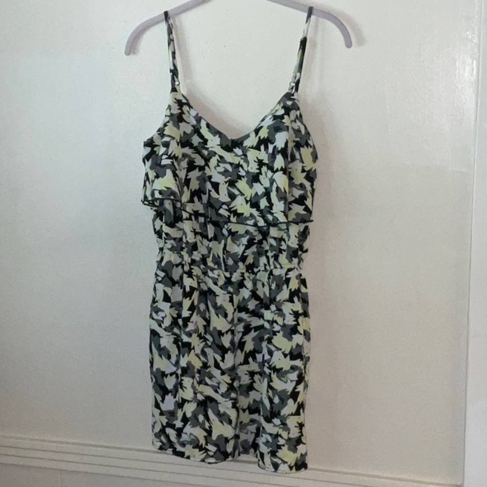 Bar III neon yellow, black, grey, and white romper, with pockets.